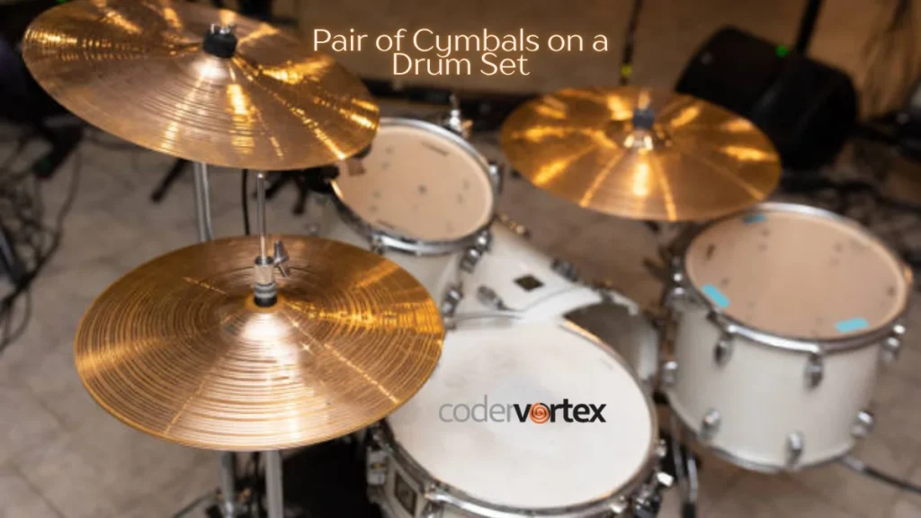 pair of cymbals on a drum set